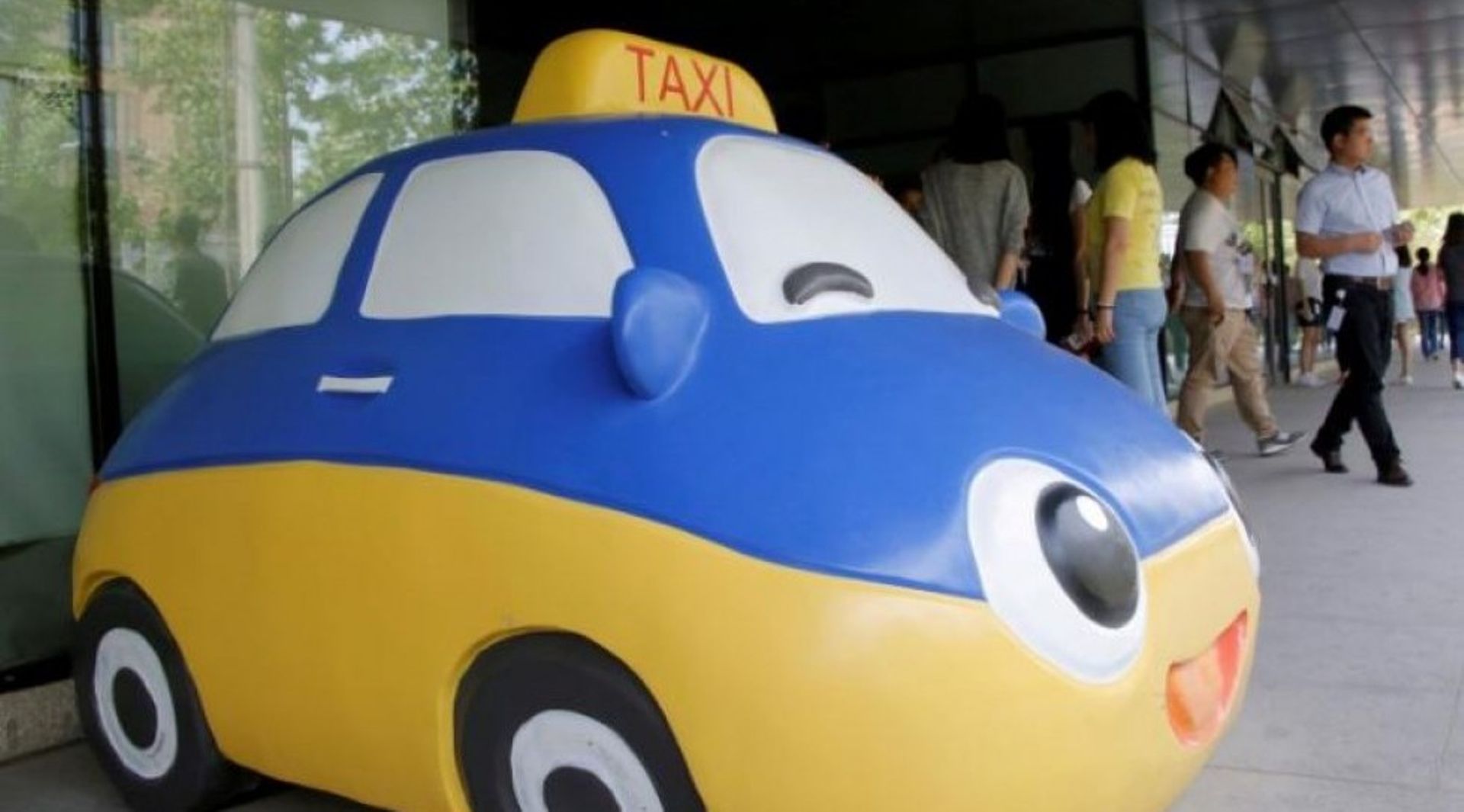 China's Didi Chuxing partners 12 automakers to build EV-sharing network