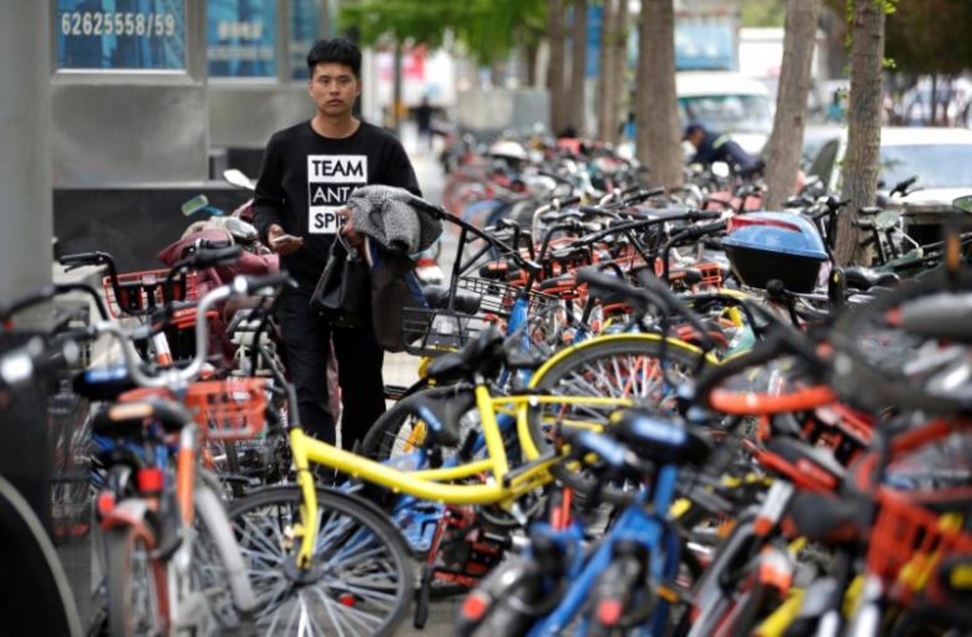 China seeks safe steering of bike-sharing boom to clear cluttered streets