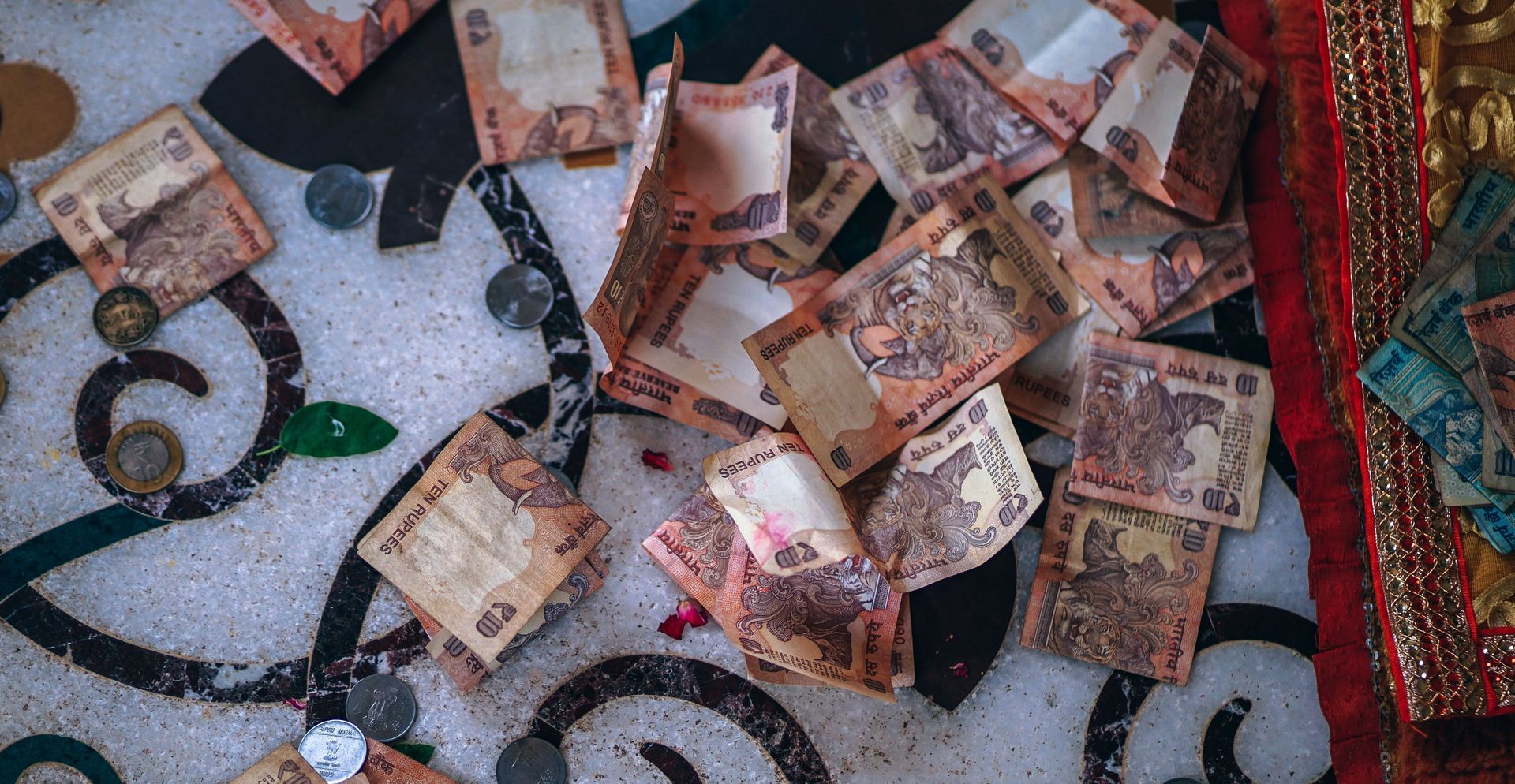 Founding firms of India's Bajaj Finserv to sell 1.6% stake for $554 million: report