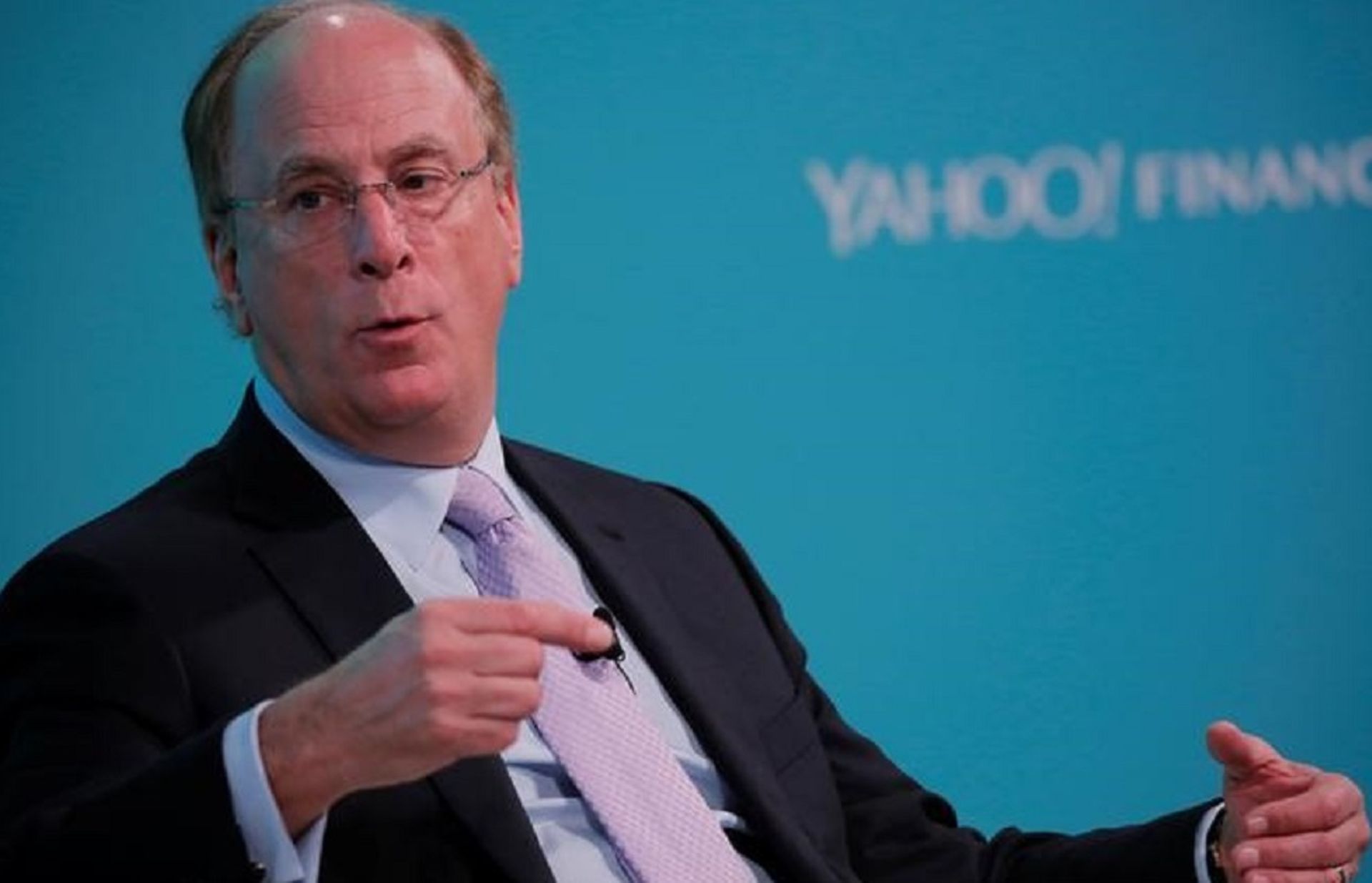 BlackRock CEO Fink says evaluating cryptocurrencies