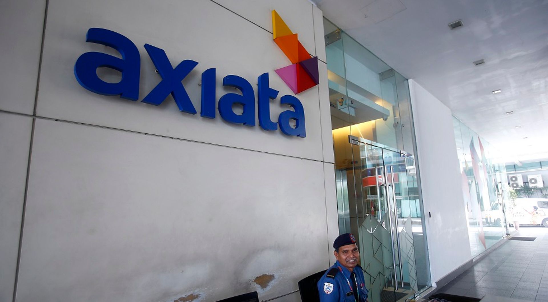 Malaysia's Axiata says merger plan with Norway's Telenor on track
