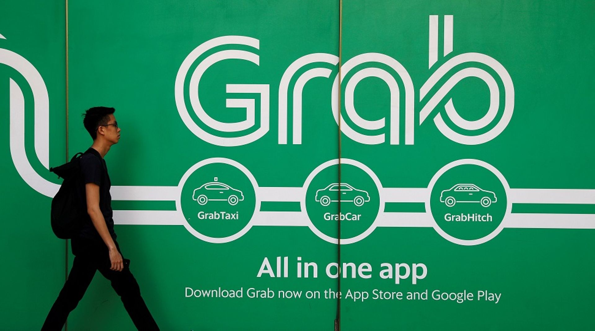 Unaware of breaching Malaysian anti-competition law after Uber buy: Grab
