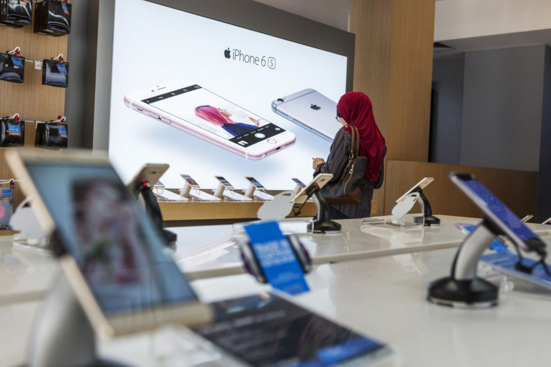 Malaysian firm Axiata in a bind over exiting its investment in Singapore's M1