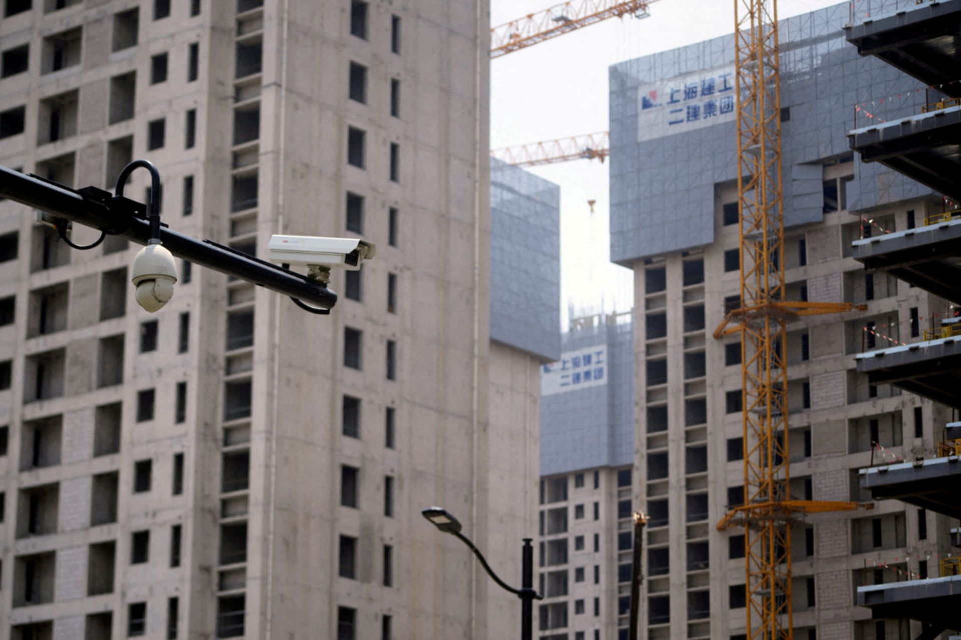 Chinese regulators urge more financing support for embattled property firms