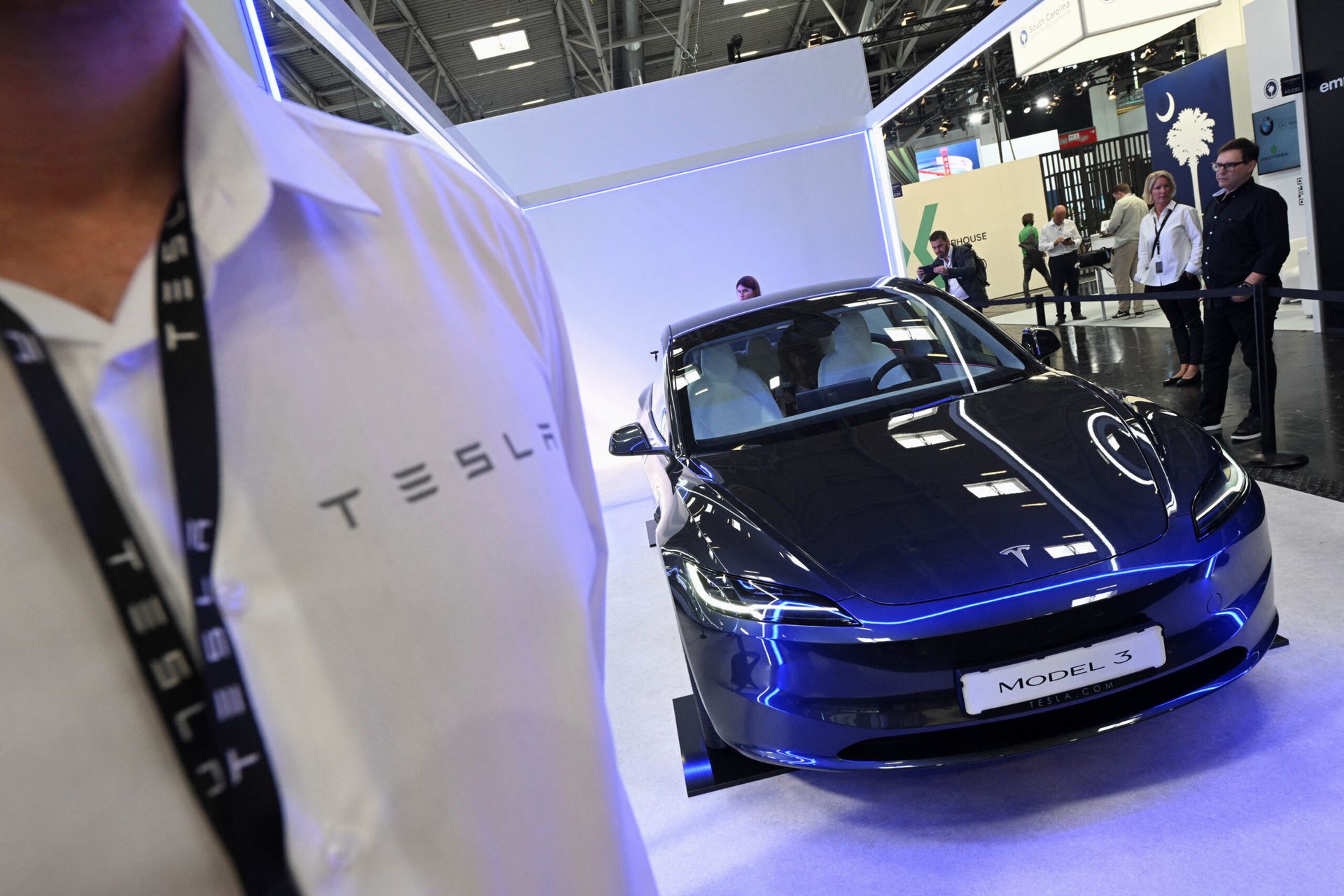 Tesla rolls out record cars in Q4, but China's BYD overtakes in EV race