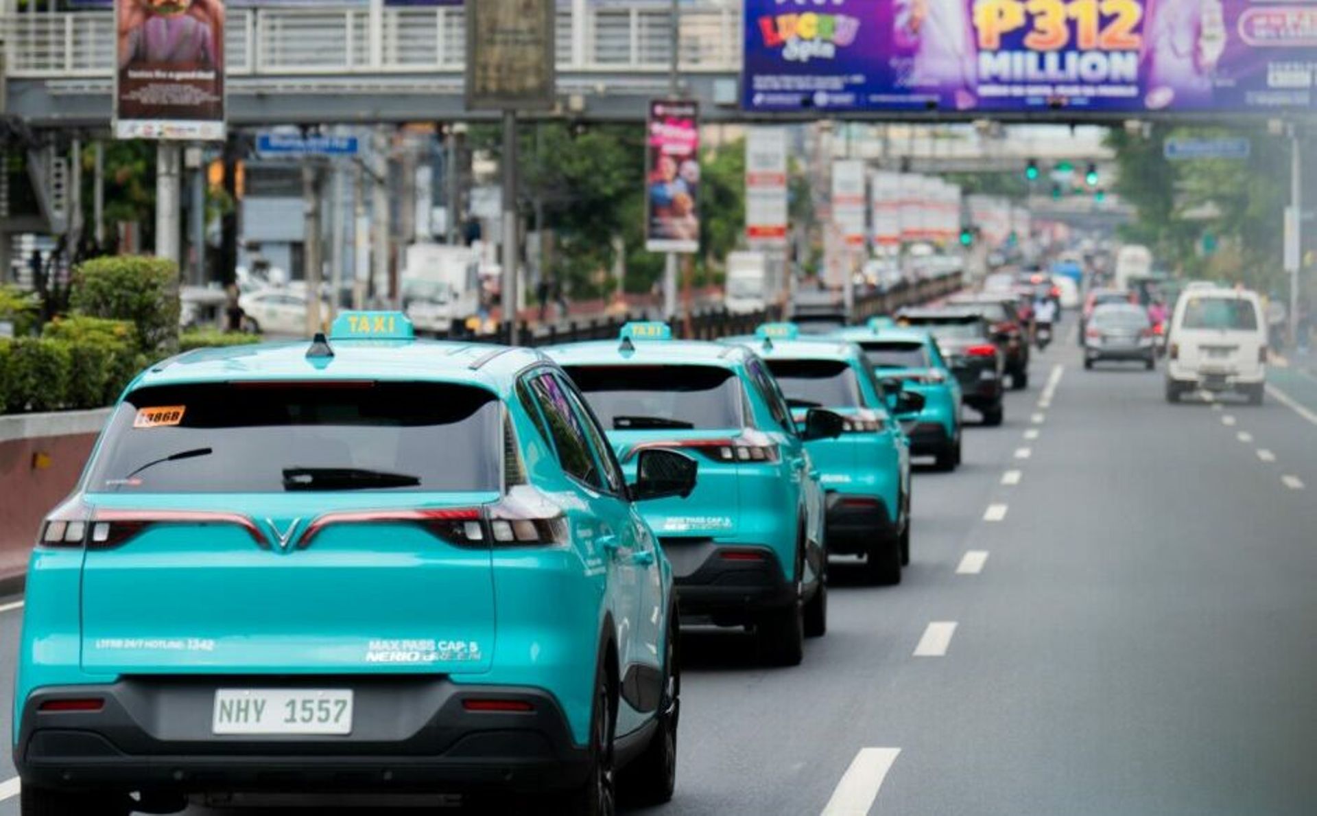 Green SM's EV taxi service overtakes Grab in Vietnam; drives into PH
