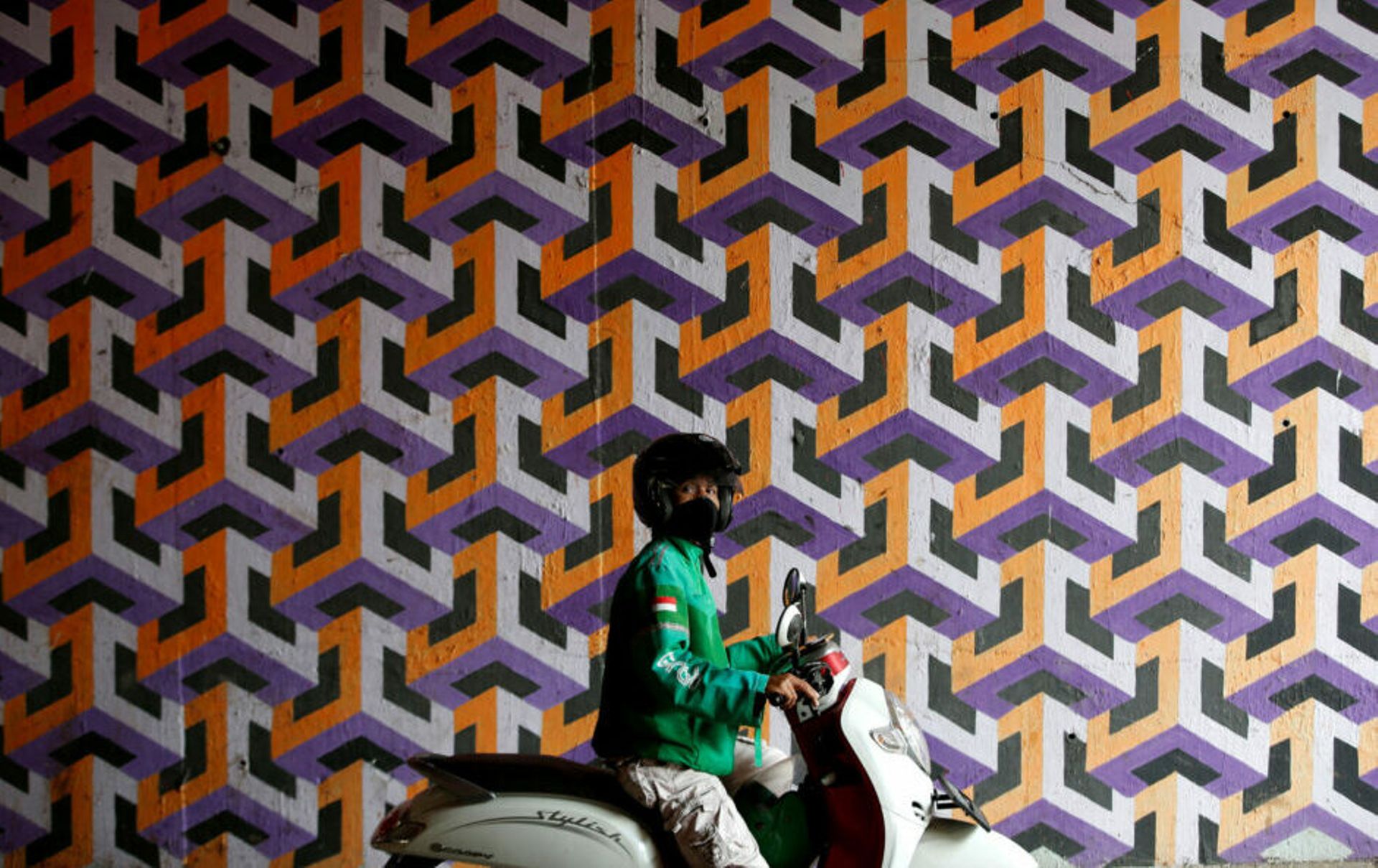 Wealth fund Danantara Indonesia considers stake in Grab-GoTo deal: report