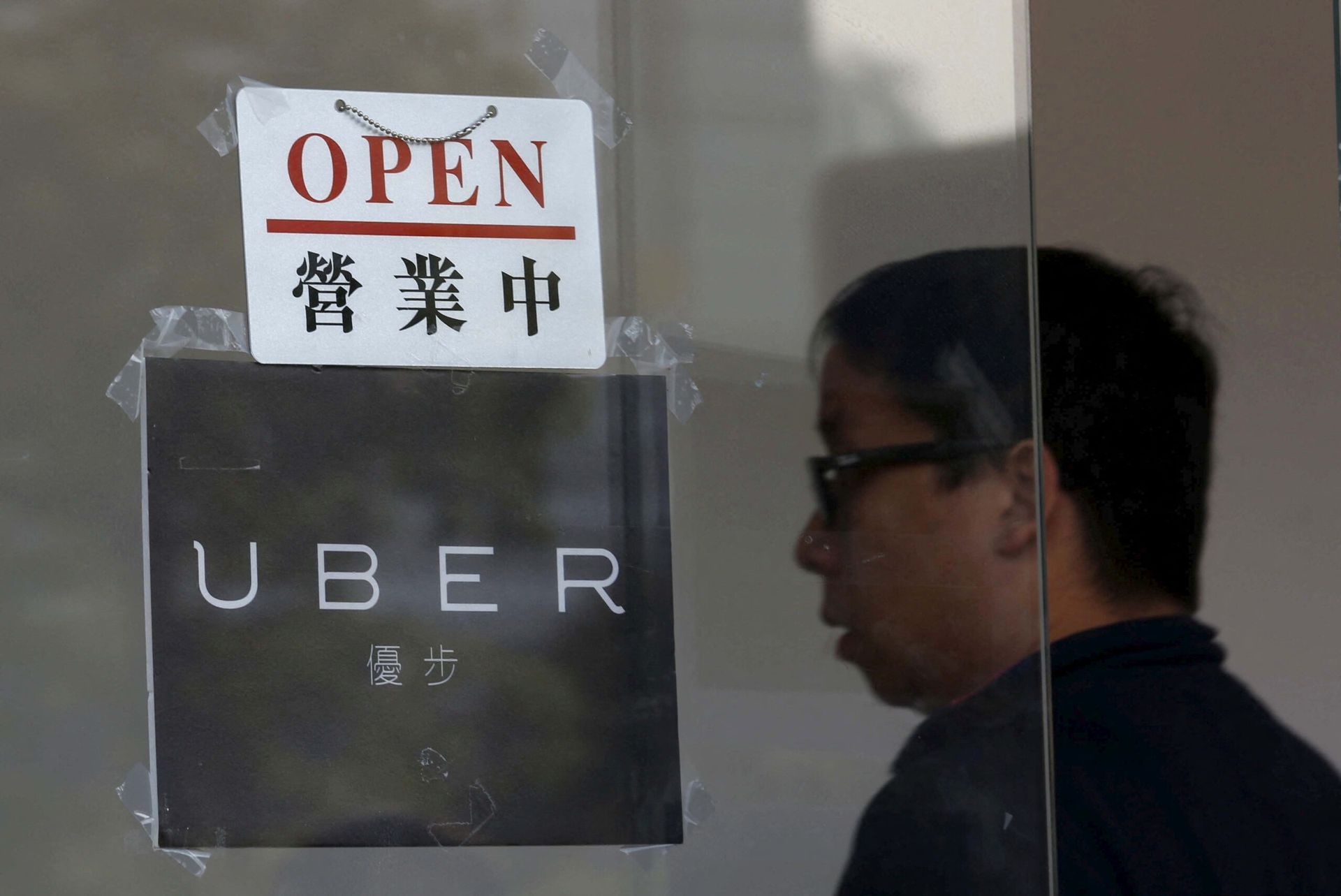 Uber, Baidu team up to launch self-driving taxis in global markets