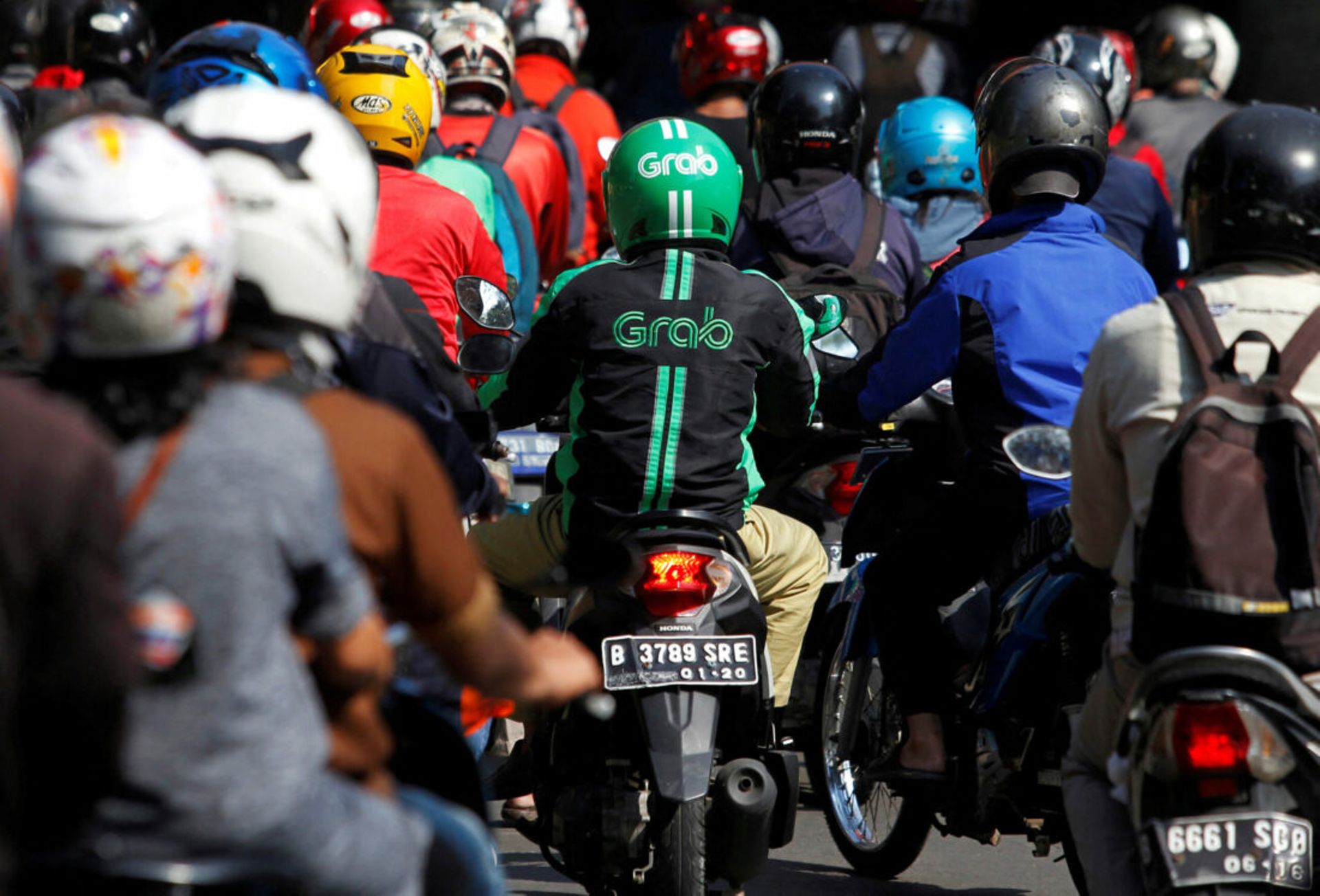Grab lifts 2026 outlook, unveils $750m buyback as one-off gain boosts Q2 profit