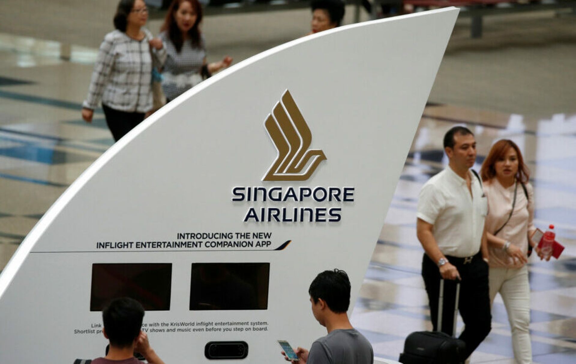 Singapore Airlines annual profit halves on one-offs; flags surging fuel costs