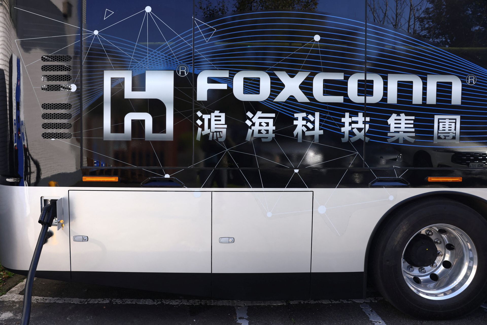 Foxconn Q2 revenue jumps, company cautions on geopolitics