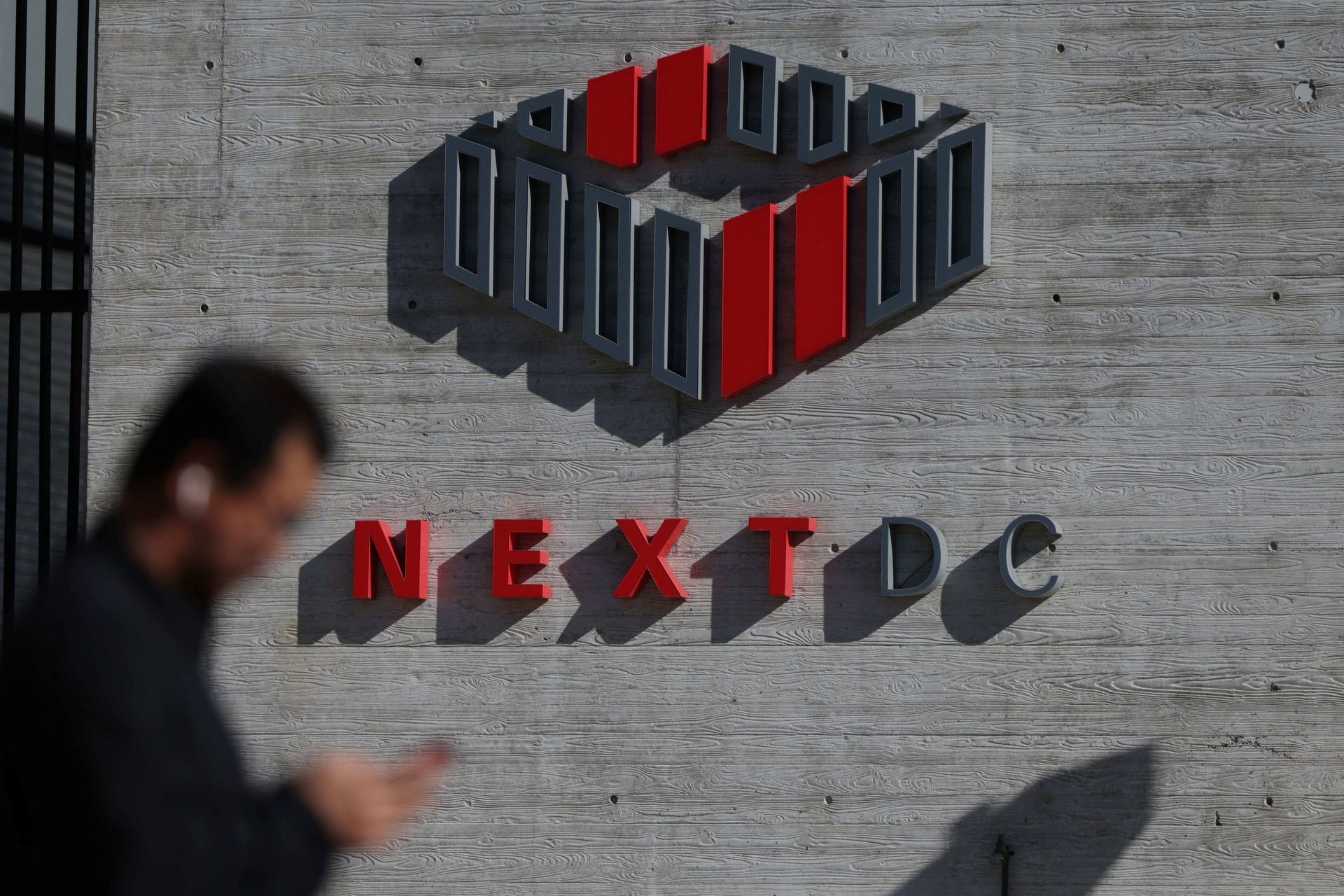 Australia's NextDC shares tank 42% amid revenue delay, deferred plans